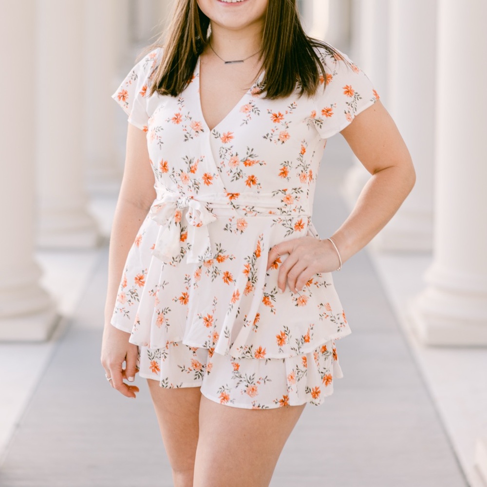 Altar’d state white and floral pattern short romper.
